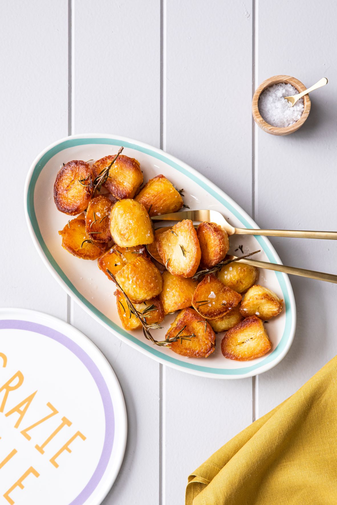 Crispy sea salt roast potatoes with fried rosemary